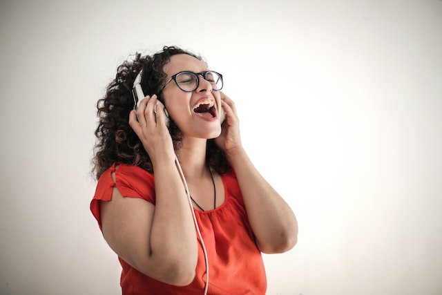 Girl in Red Singing.